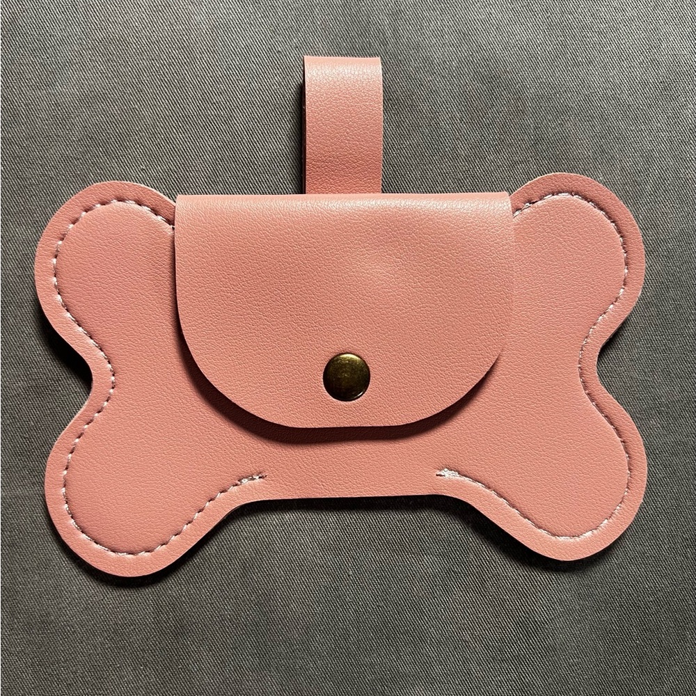 Pink Faux Lather poop bag holder.